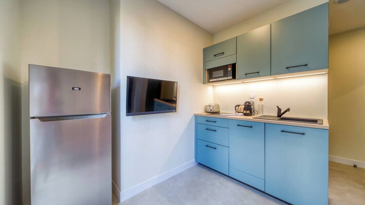 Photo of Kitchen in Quartier Exposition-Bajatiere