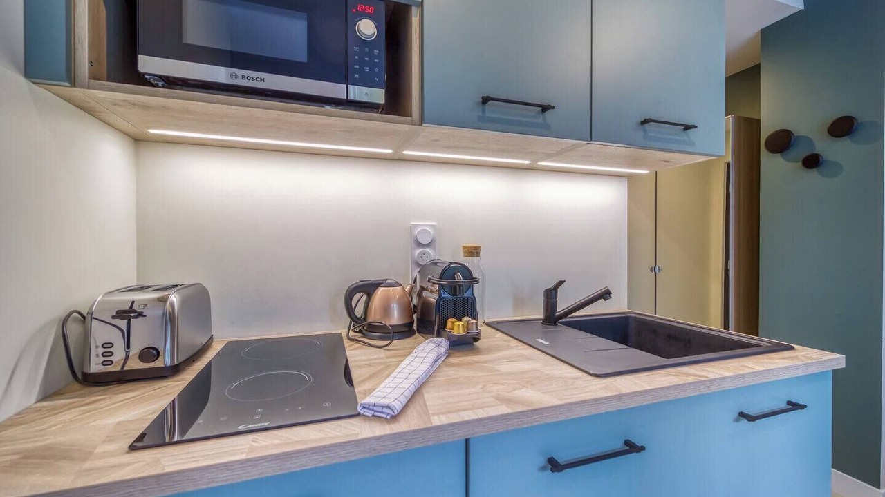 Photo of Kitchen in Quartier Exposition-Bajatiere