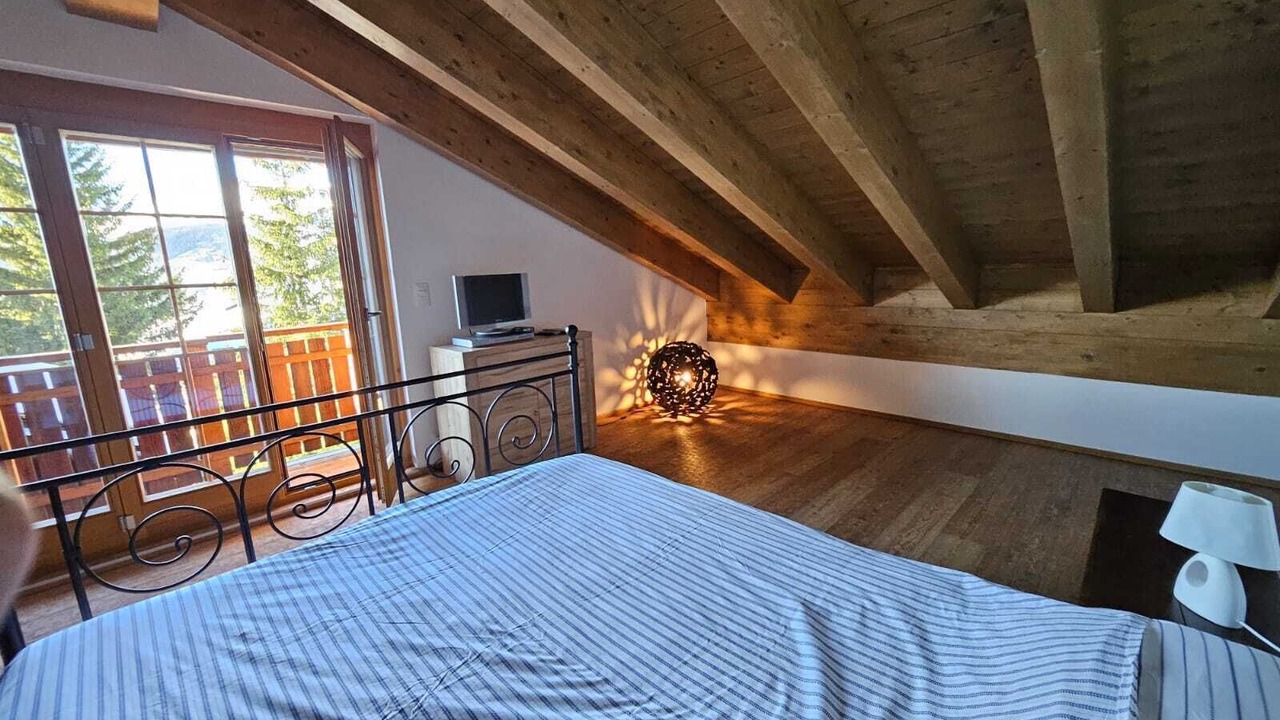 Photo of Bedroom in Lens