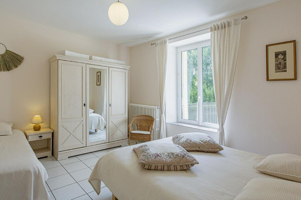 Photo of Bedroom in Saint-Lubin-en-Vergonnois