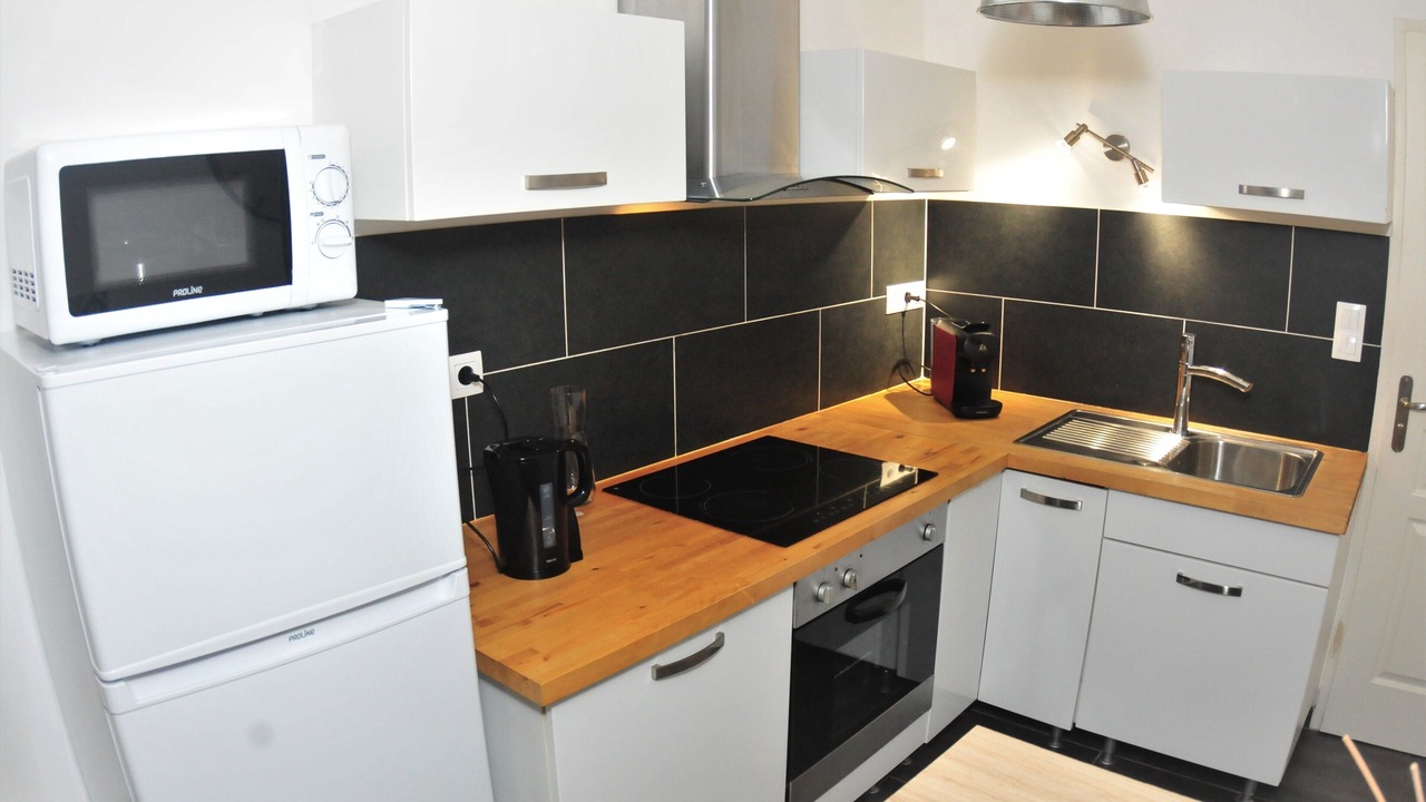 Photo of Kitchen in Poincare - Foch - Anatole France - Croix de Bourgogne