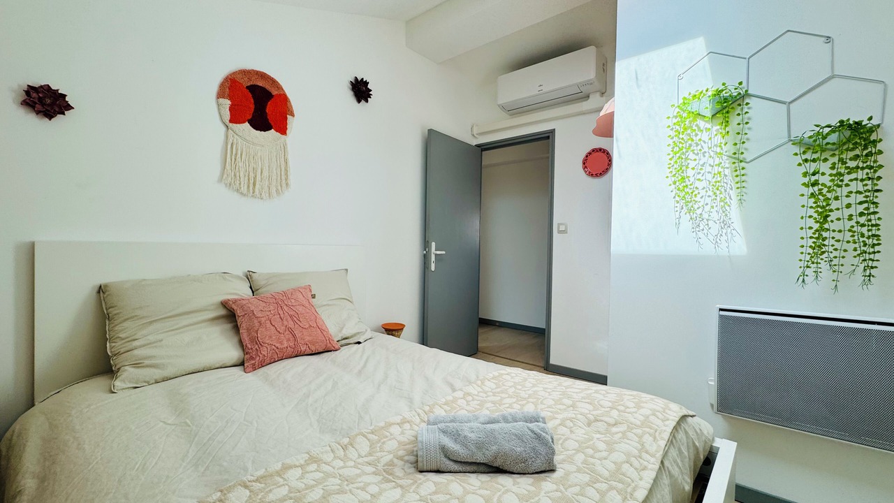 Photo of Bedroom in Moliere - Edgard Quinet
