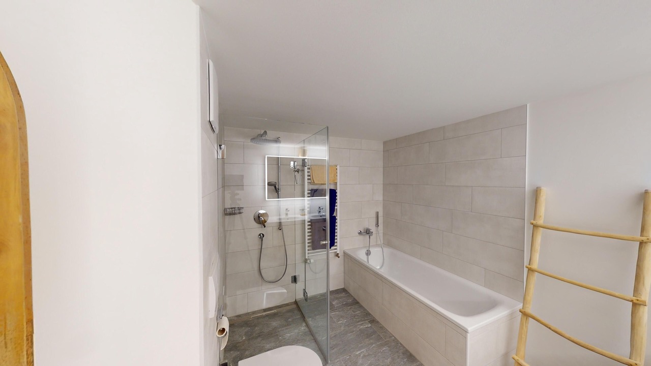 Photo of Bathroom in La Punt-Chamues-ch