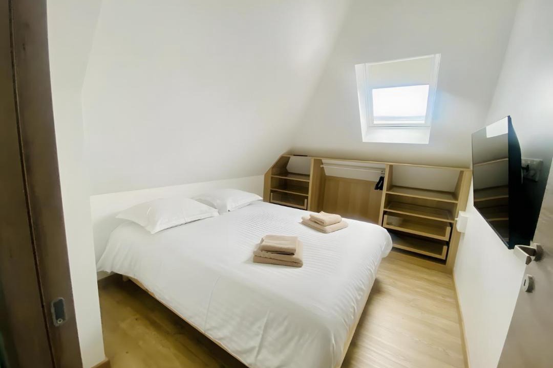 Photo of Bedroom in Saint-Quentin-en-Tourmont