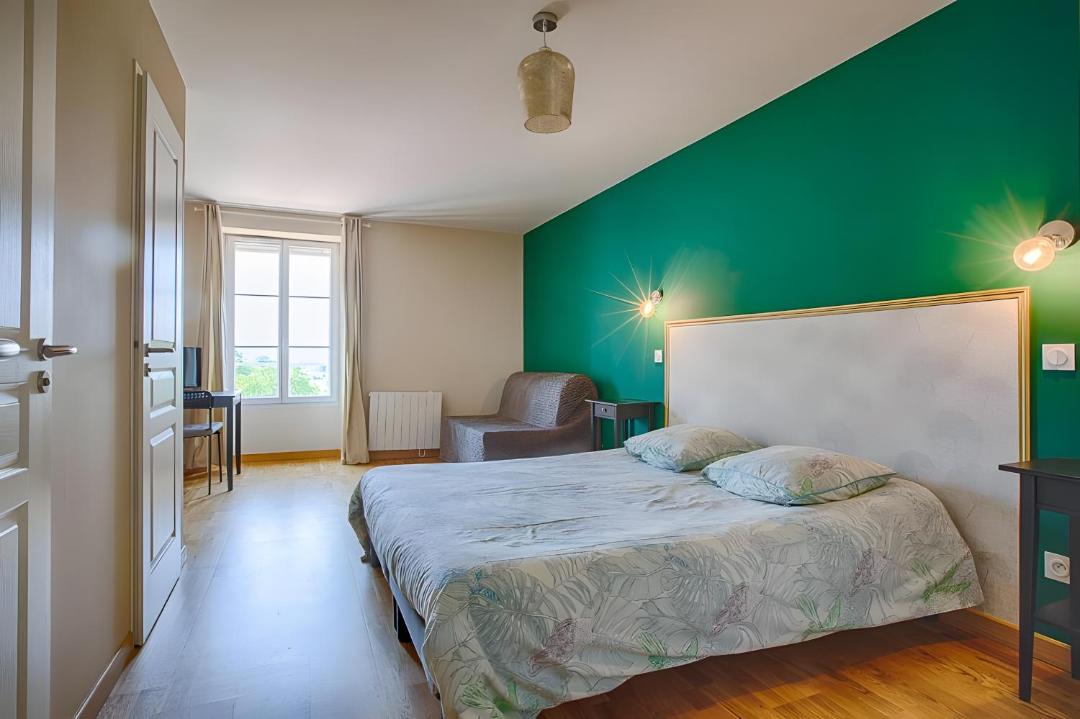 Photo of Bedroom in Saint-Bonnet-de-Valclerieux