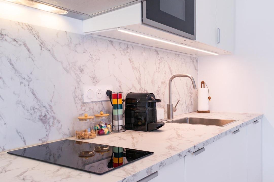 Photo of Kitchen in Quartier Exposition-Bajatiere