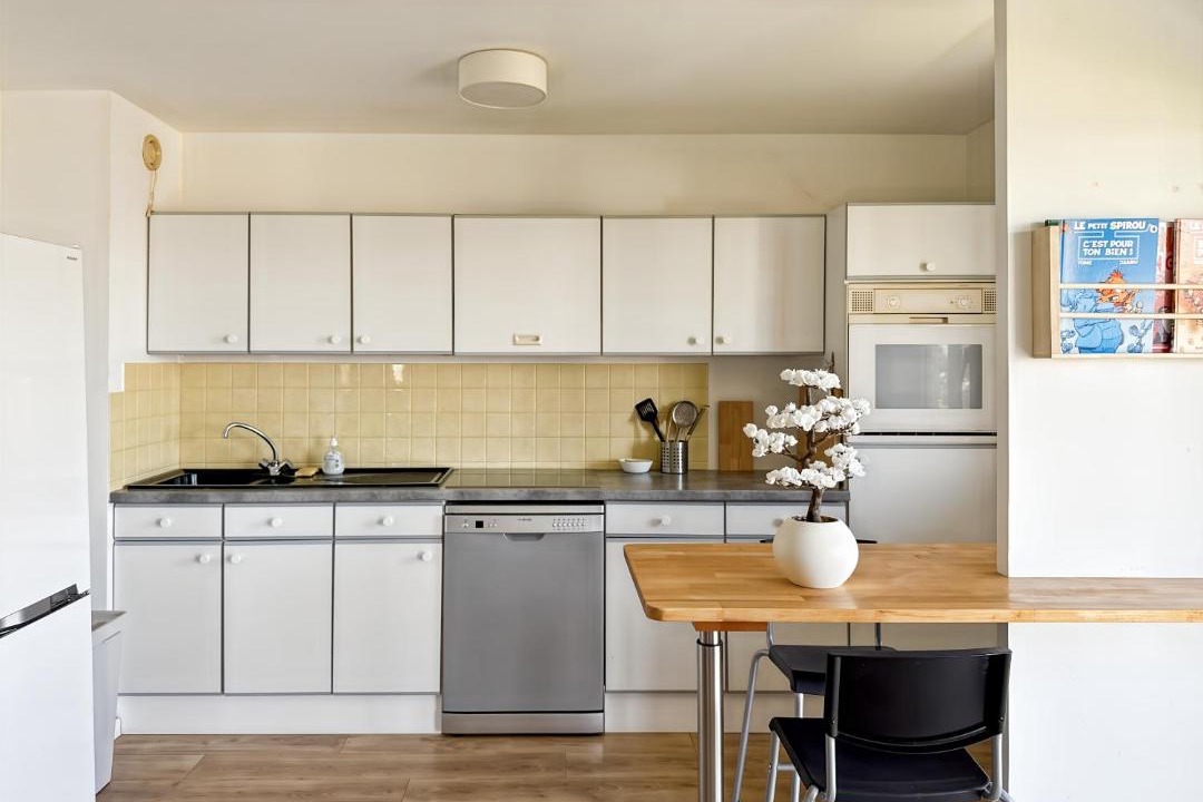 Photo of Kitchen in Quartier Francisco-Ferrer - Landry - Bourgeois - Poterie