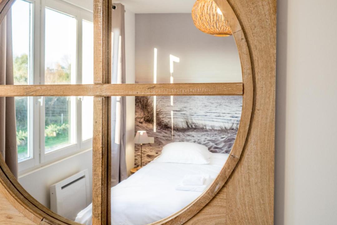 Photo of Bedroom in Saint-Quentin-en-Tourmont