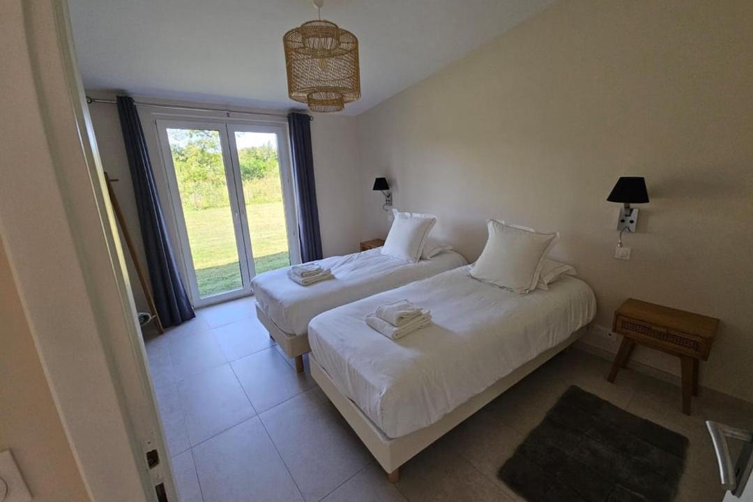 Photo of Bedroom in Saint-Quentin-en-Tourmont