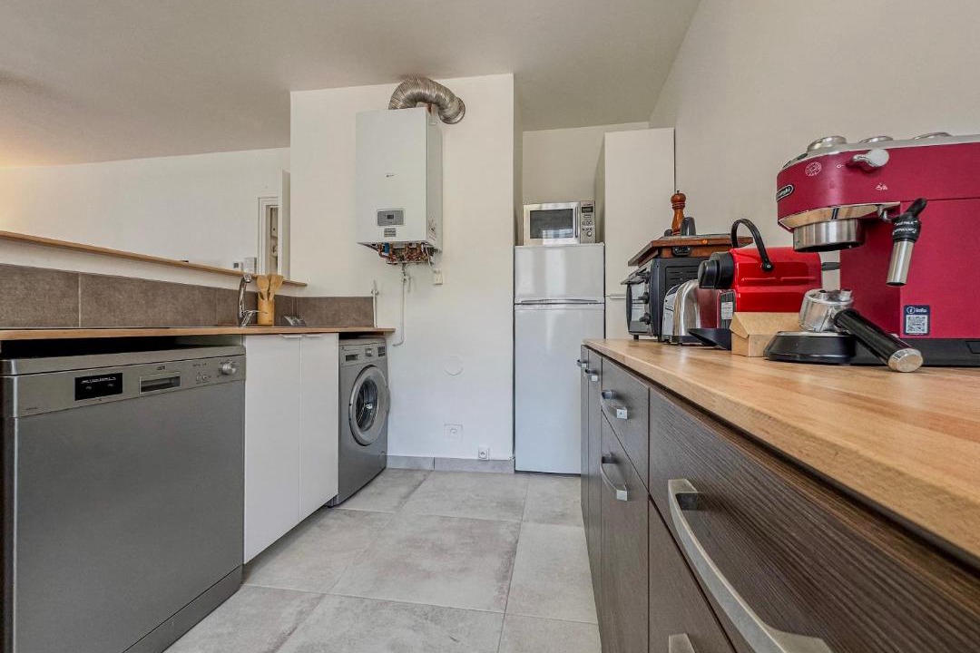 Photo of Kitchen in Quartier Exposition-Bajatiere