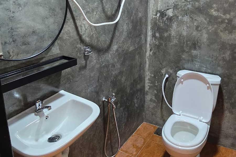 Photo of Bathroom in Air Kuning
