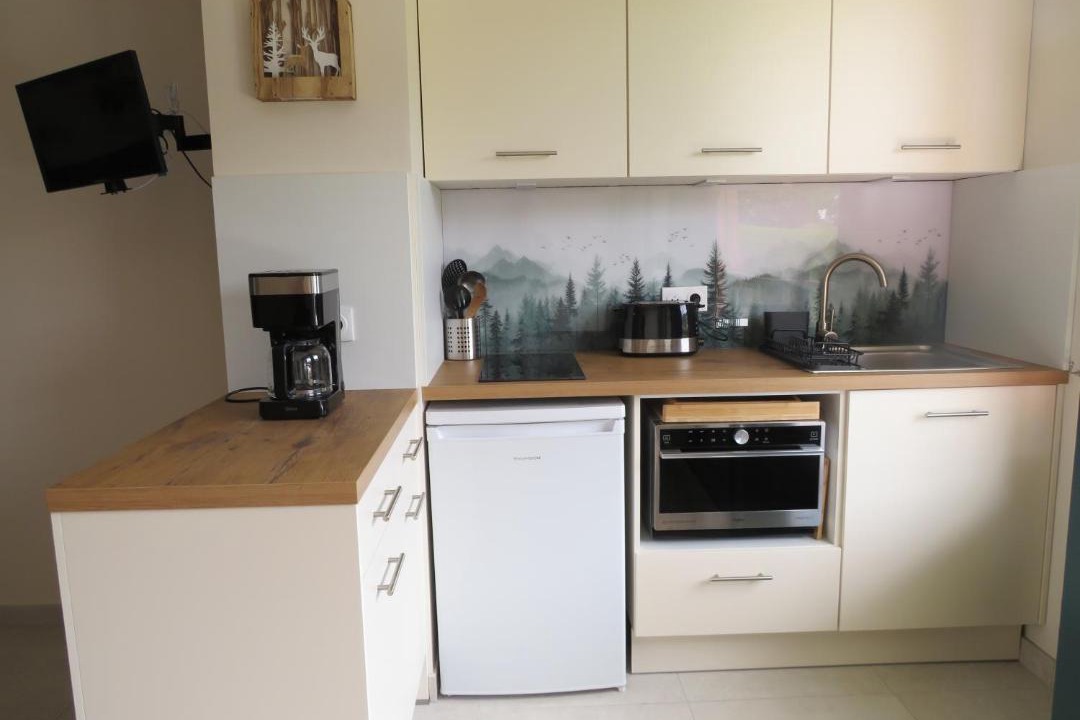 Photo of Kitchen in Demi-Quartier