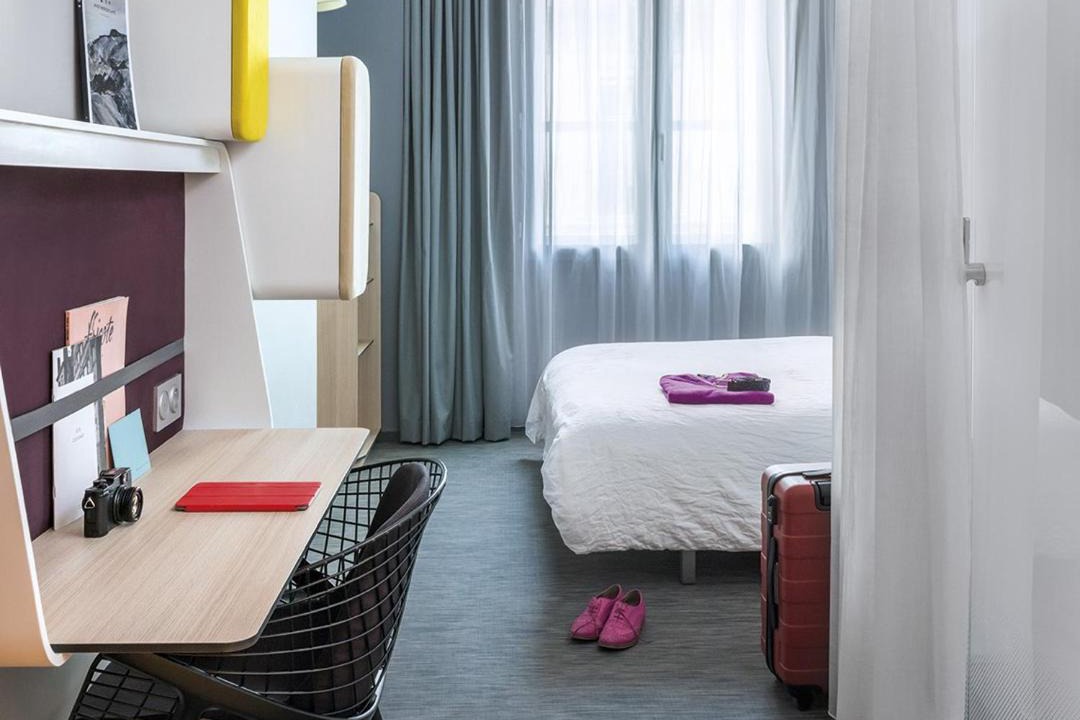 Photo of Bedroom in Moliere - Edgard Quinet