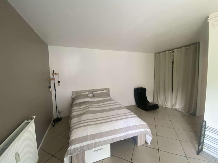 Photo of Bedroom in Royallieu Pompidou