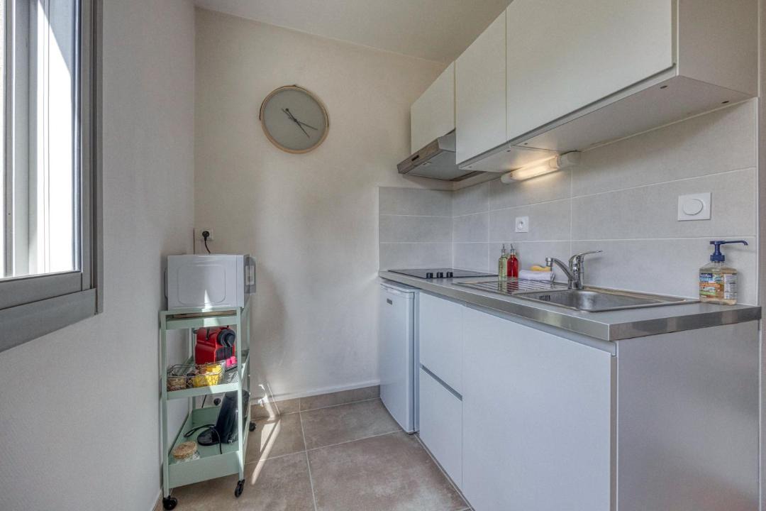 Photo of Kitchen in Quartier Exposition-Bajatiere