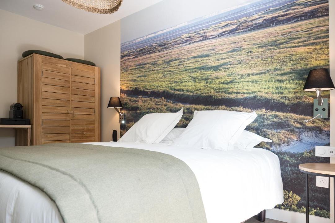 Photo of Bedroom in Saint-Quentin-en-Tourmont