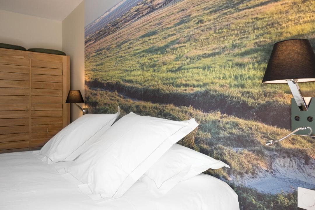 Photo of Bedroom in Saint-Quentin-en-Tourmont