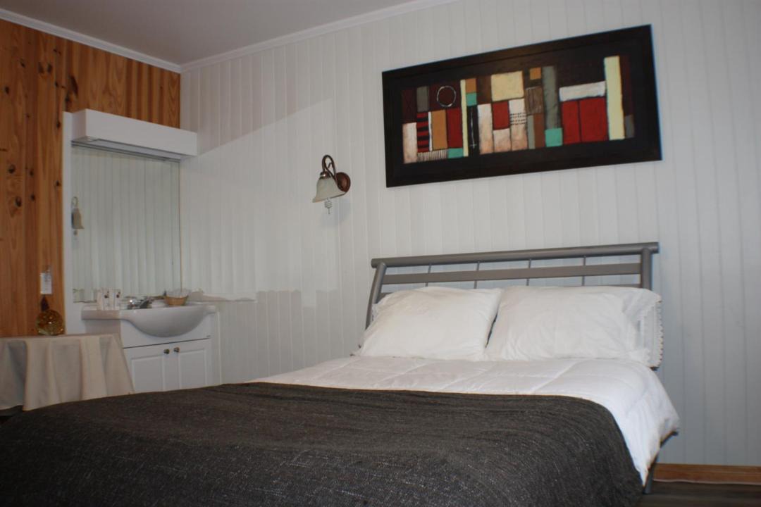 Photo of Bedroom in Saint-Tite-des-Caps