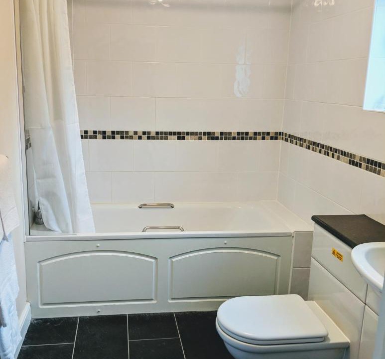 Photo of Bathroom in Matching Tye