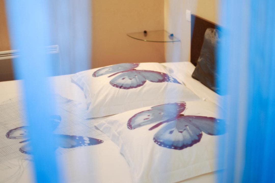 Photo of Bedroom in Moliere - Edgard Quinet