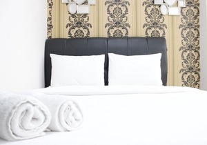 Compact Studio Room at Sudirman Suites Apartment