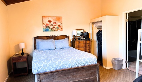 Queen Room with a Wood Burning Fireplace