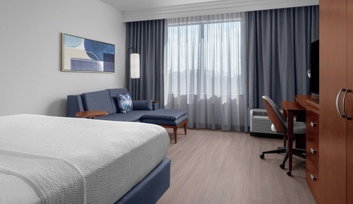 Suite, 1 King Bed with Sofa bed, Roll-in Shower, Balcony