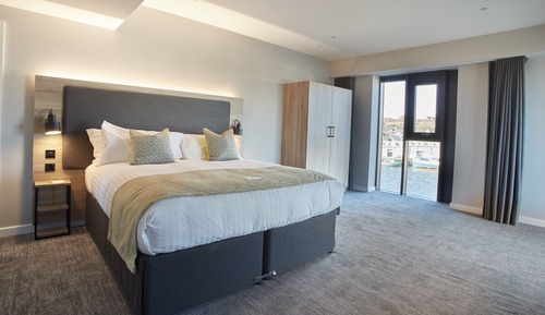 Deluxe Room with Waterfront View and Balcony