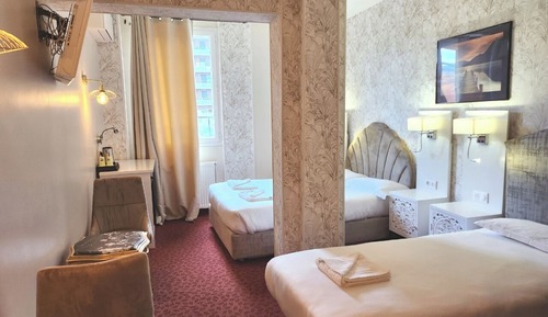 Deluxe Triple Room