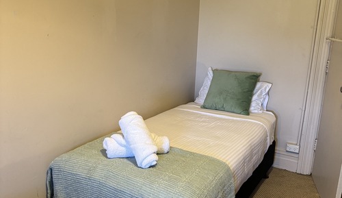 Single Room, Shared Bathroom