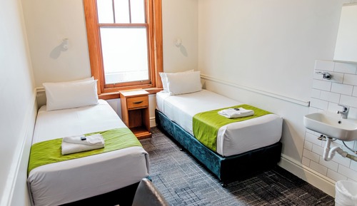 Standard Room, 2 Twin Beds, Shared Bathroom