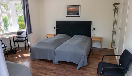 Dobbeltværelse med terrasse - med mulighed for tilkøb af en ekstra opredning - kæledyr ikke tilladt