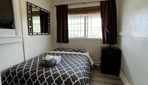 Private Queen, Shared Bathroom