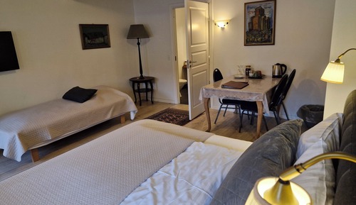 Deluxe Triple Room, Multiple Beds, Courtyard View