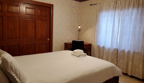 Comfort Room, 1 Queen Bed, Shared Bathroom