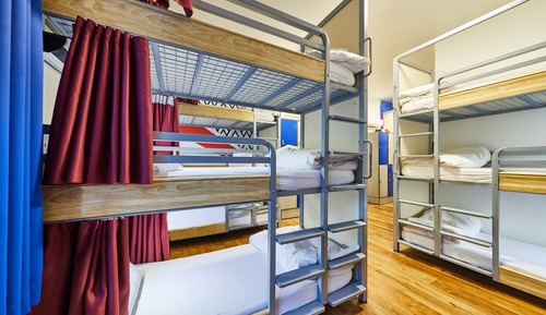 Bed in 21 Bed Dorm with Shared Bathroom (Triple Bunks)