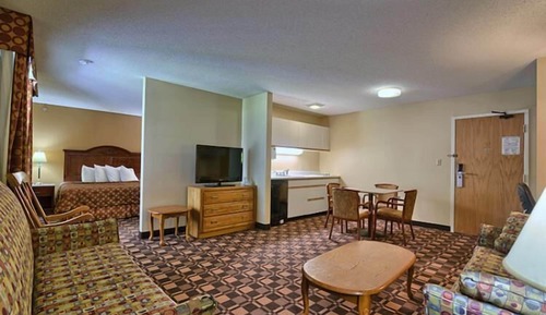 King Bed with two sofa beds and kitchenette