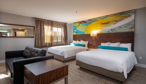 2 Queen Beds with Sofabed Suite