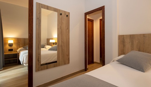 Quadruple Room (3 Adults + 1 Child)