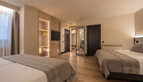 Quadruple Room (2 adults + 2 children)