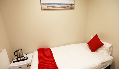 Single Room, Shared Bathroom