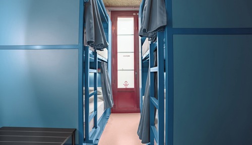 Bed in a 4-bed shared room with private bathroom