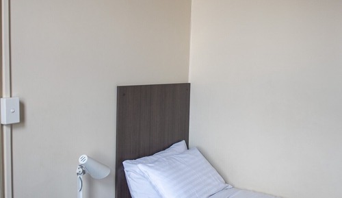 Basic Room, 1 Twin Bed, Shared Bathroom