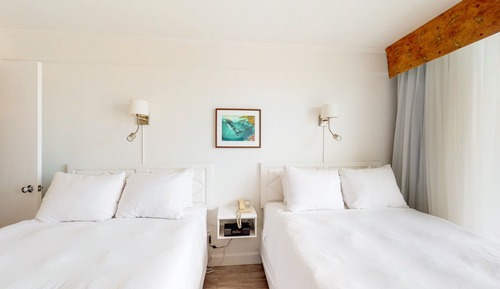 City side, 2 Queen's with shared balcony