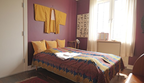 Dobbeltværelse med dobbeltseng eller 2 enkeltsenge  med fælles badeværelser