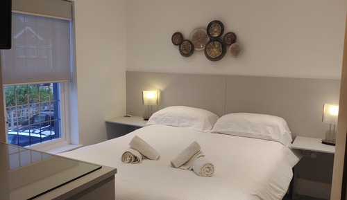 Three-Bedroom Apartment with Balcony and Terrace