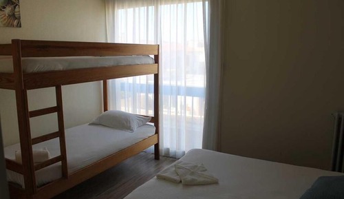 Quadruple Room, Multiple Beds, Partial Sea View