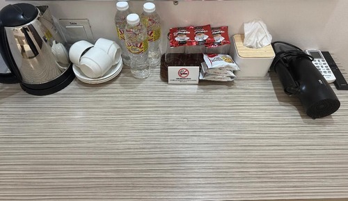 Superior Family Room, No Windows (1 King Bed + 1 Single Bed)