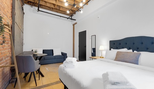 Exclusive Room, 1 Queen Bed with Sofa bed (Shared Bathroom)