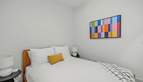 Two-Story Two Bedroom Balcony + Laundry